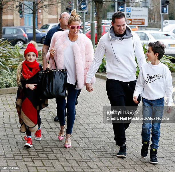 Katie Price arrives at the New Victoria Theatre with daughter Princess, husband Kieran Hayler and son Junior Andre on December 18, 2015 in Woking,...