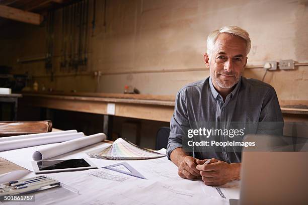 he's más feliz en su taller - architect fotografías e imágenes de stock