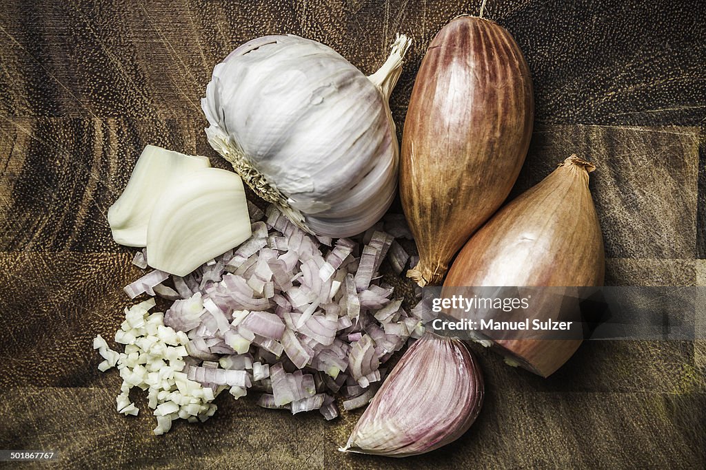 Ingredients for making green curry paste - onion, garlic