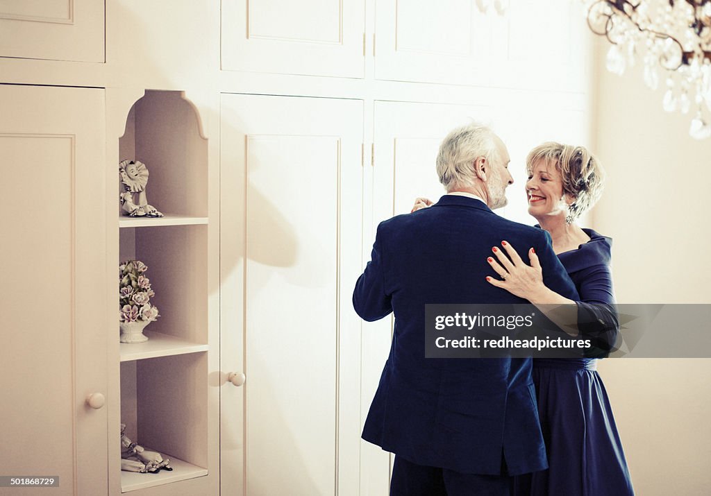 Couple dancing in bedroom