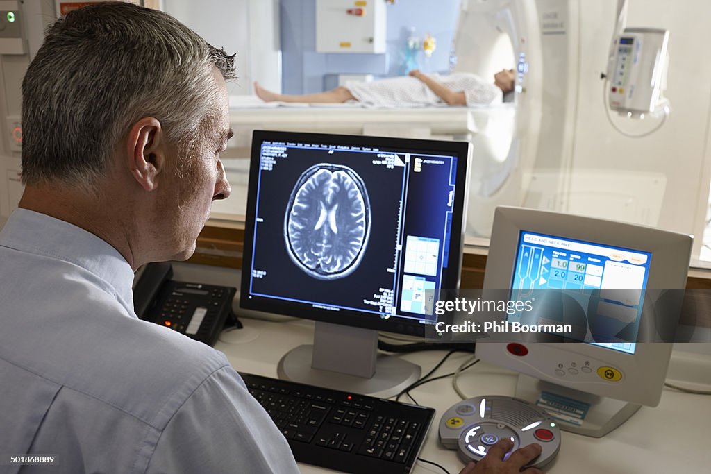 Real Radiologists Computer Radiologist Looking At Brain Scan Image On Computer Screen High-Res ...
