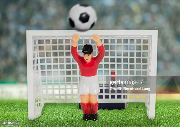 digitally generated image of soccer goalkeeper in stadium - fantasy football stock pictures, royalty-free photos & images