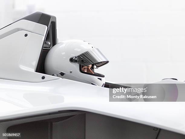 test driver in crash helmet in supercar - racing driver stock pictures, royalty-free photos & images