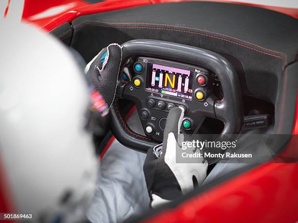 close up of driver in supercar cockpit - will power race car driver stock pictures, royalty-free photos & images