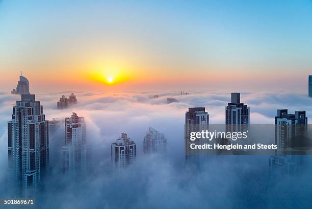 downtown dubai at dawn, united arab emirates - skyscraper clouds stock pictures, royalty-free photos & images