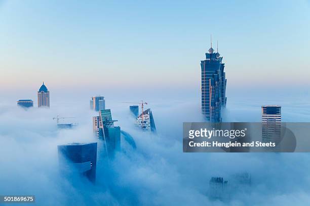 downtown dubai at dawn, united arab emirates - height stock pictures, royalty-free photos & images