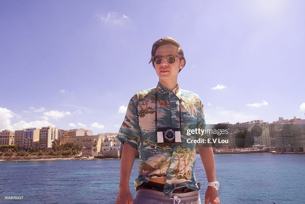 Portrait of man with camera, Ta' Xbiex harbor, Gzira, Malta