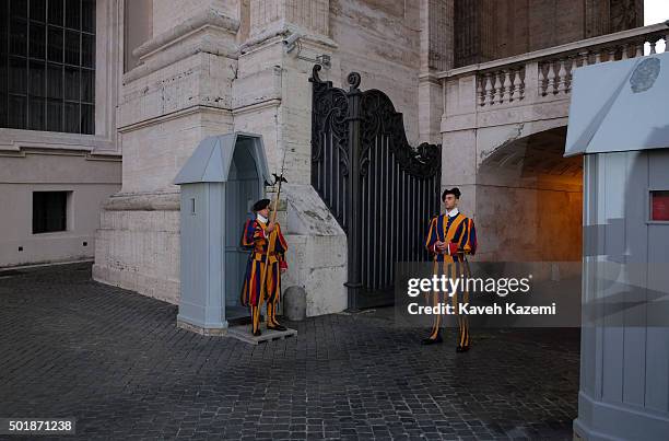 Swiss Guards stand at the entrance of the headquarters of the Roman Catholic Church on October 15, 2015 in Vatican City, Italy.