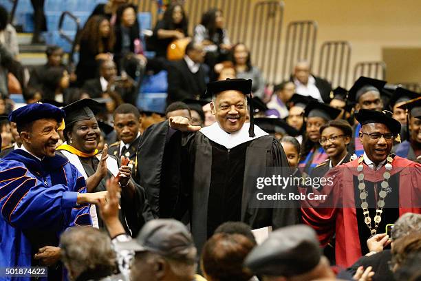 Morgan State University Board of Regents Chairman Kweisi Mfume , Rev. Jesse Jackson and university president David Wilson joke with the crowd before...