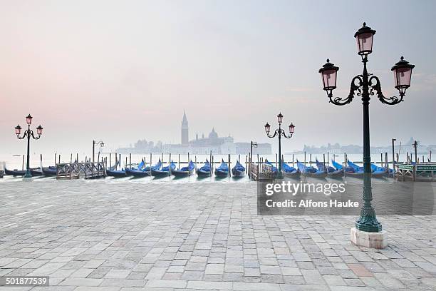 gondolas and san giorgio maggiore at back, from st mark's square, venice, venezien, italy - venezien photos et images de collection