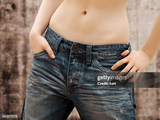 girl, teenager, bare belly, in jeans - belt loop stock pictures, royalty-free photos & images