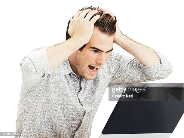 businessman with laptop, tearing his hair in despair - tearing your hair out photos et images de collection