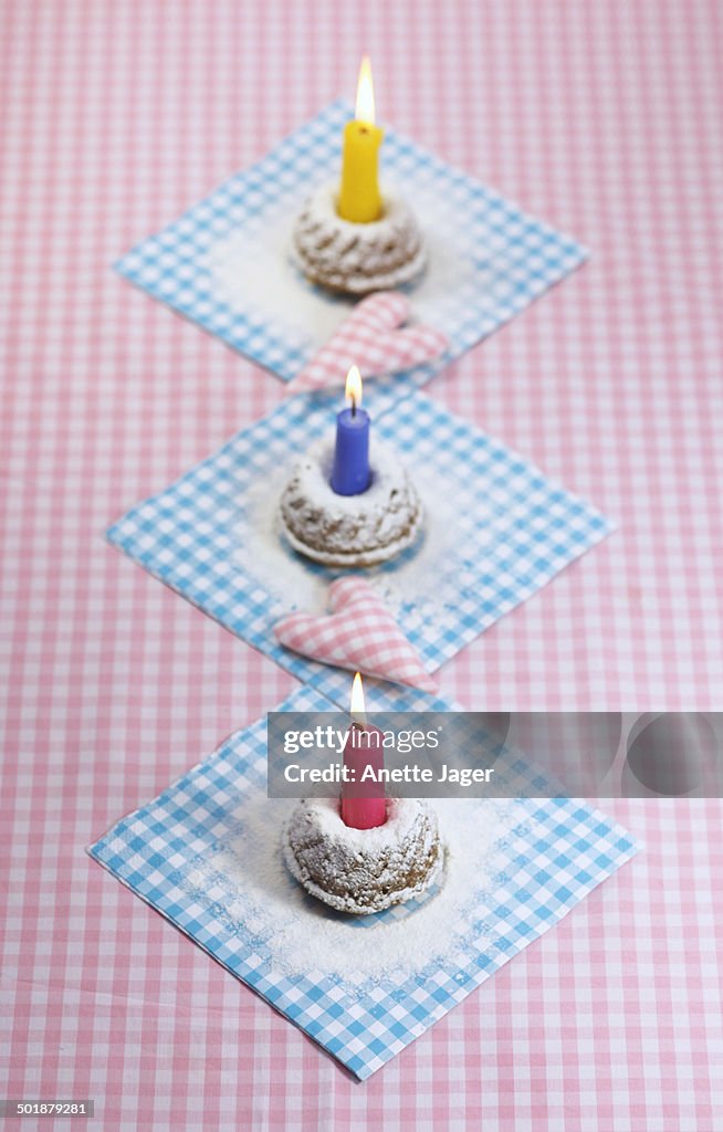 Three small birthday cakes