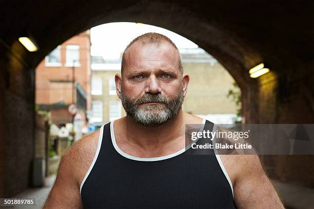 bearded man in london tunnel - forzudo fotografías e imágenes de stock