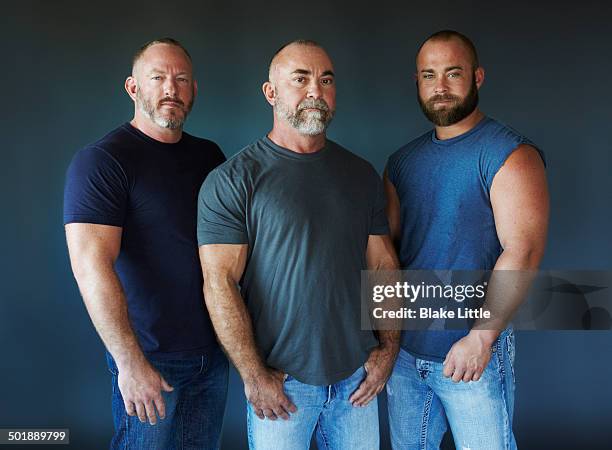 three men standing - hingst bildbanksfoton och bilder