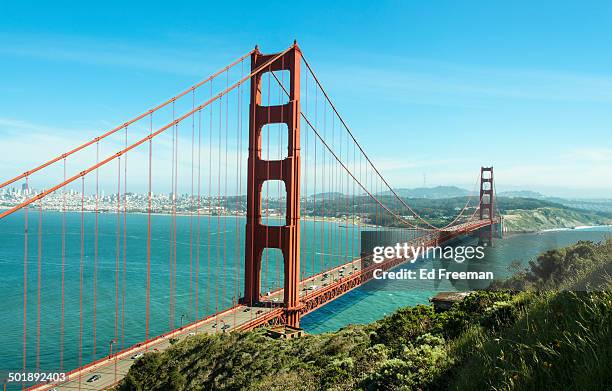 golden gate bridge on a sunny day - golden gate stock-fotos und bilder