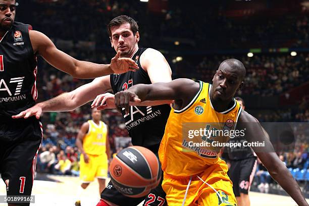 Ousmane Camara, #12 of Limoges CSP competes with Stanko Barac, #27 of EA7 Emporio Armani Milan during the Turkish Airlines Euroleague Basketball...