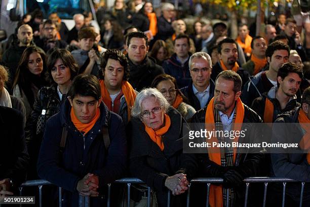 Supporters of Ciudadanos party leader Albert Rivera listen to the final electoral campaign rally at Plaza de Santa Ana on December 18, 2015 in...