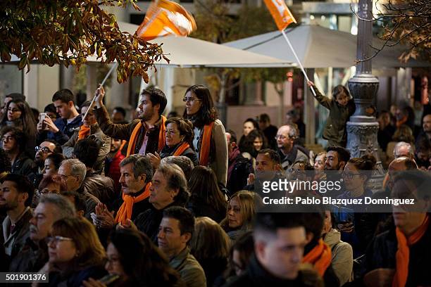 Supporters wave a flag of Ciudadanos party during the final electoral campaign rally at Plaza de Santa Ana on December 18, 2015 in Madrid, Spain....