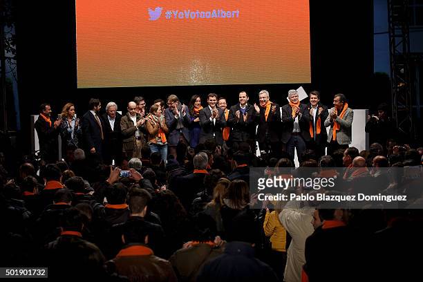 Ciudadanos party leader Albert Rivera stands on stage with other members of his party at the en of the final electoral campaign rally at Plaza de...