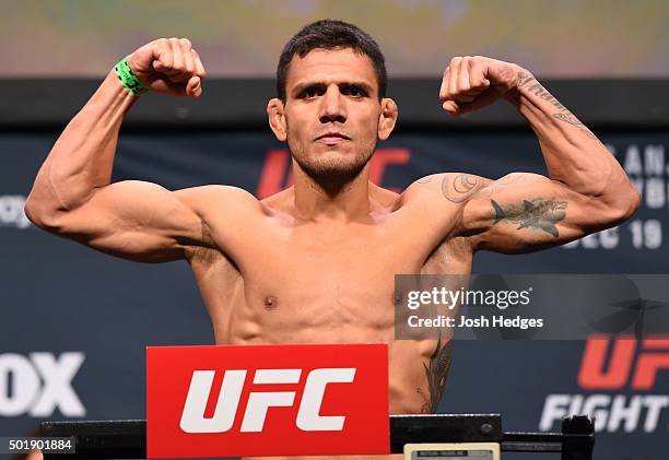 Rafael dos Anjos of Brazil weighs in during the UFC weigh-in at the Orange County Convention Center on December 18, 2015 in Orlando, Florida.