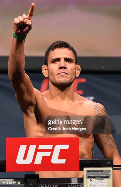 Rafael dos Anjos of Brazil weighs in during the UFC weigh-in at the Orange County Convention Center on December 18, 2015 in Orlando, Florida.
