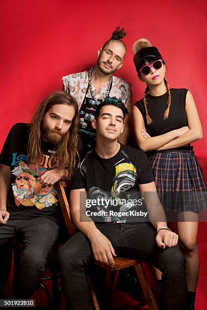 Pose for a portrait at the 16th Annual TJ Martell Foundation New York Family Day on December 13, 2015 at Brooklyn Bowl in New York City.