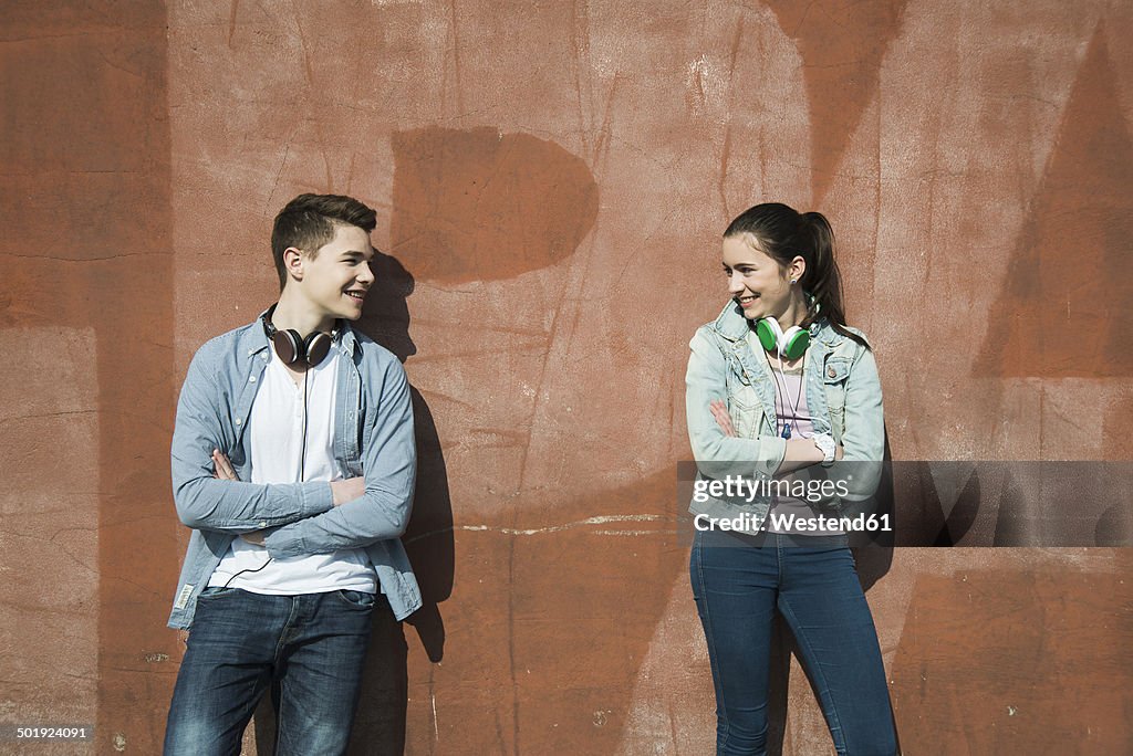 Teenage boy and teenage girl communicating