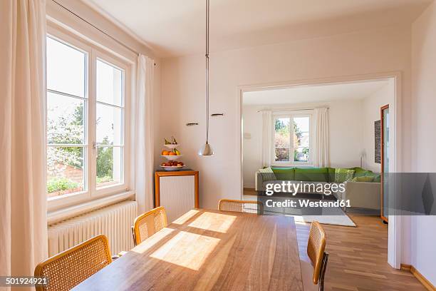 germany, baden-wuerttemberg, stuttgart, dining room and living room - dining room stock pictures, royalty-free photos & images