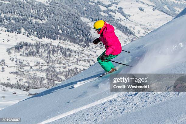 switzerland, graubuenden, obersaxen, female skier - ski stockfoto's en -beelden