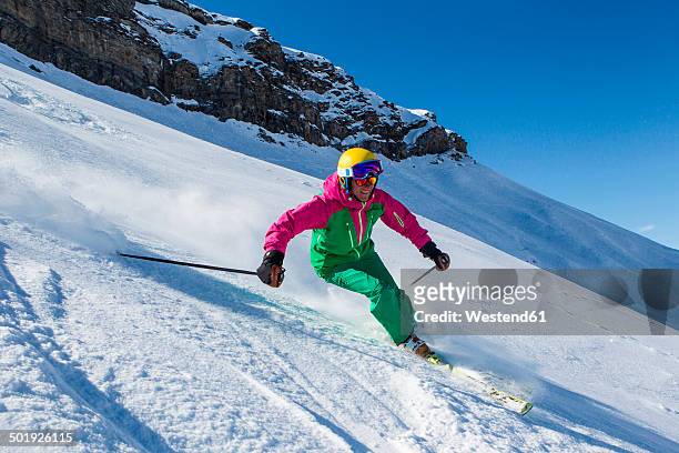 switzerland, graubuenden, obersaxen, female skier - northern european descent stockfoto's en -beelden