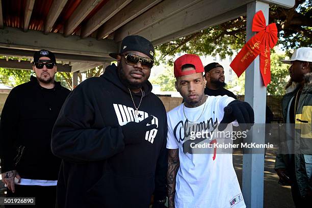 WorldStarHipHop founder Lee "Q" Odenat and recording artist Kid Ink attend WorldStarHipHop's 3rd Annual Skid Row Xmas on December 18, 2015 in Los...
