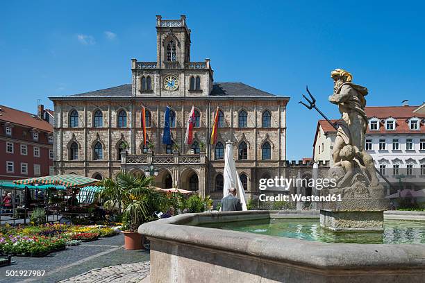 germany, thuringia, weimar, townhall and neptune fountain at market square - weimar foto e immagini stock