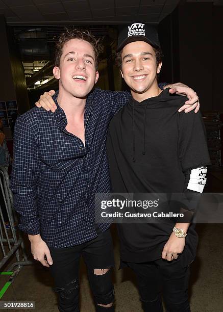 Charlie Puth and Austin Mahone pose backstage at Y100's Jingle Ball 2015 presented by Capital One at BB&T Center on December 18, 2015 in Sunrise,...