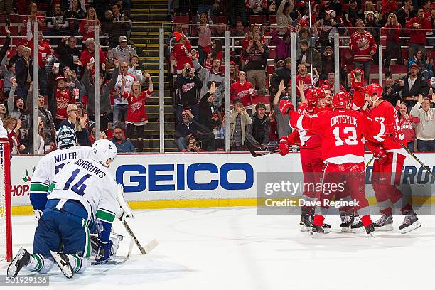 Joakim Andersson of the Detroit Red Wings celebrates his goal with teammates Pavel Datsyuk, Danny DeKeyser and Jonathan Ericsson in front of...