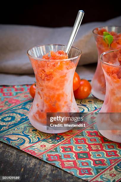 glasses of tomato granita and cherry tomatoes - fruit sorbet stock pictures, royalty-free photos & images