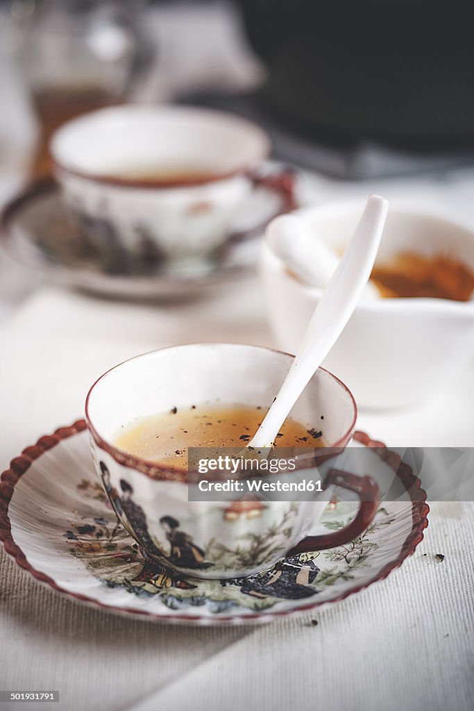 Cup of turmeric tea spiced with pepper