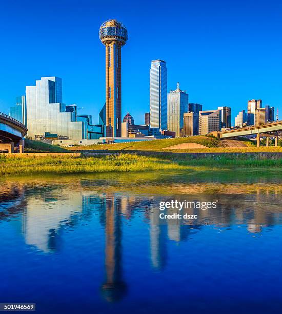 dallas skyline over water reflection in daylight with cityscape skyscrapers - dallas skyline stock pictures, royalty-free photos & images