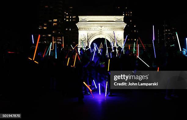Fans participate in the Star Wars Lightsaber Battle "The Light Battle Tour" - New York City at Washington Square Park on December 18, 2015 in New...