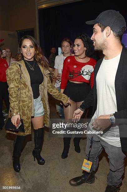 Becky G, Demi Lovato and Wilmer Valderrama backstage at Y100's Jingle Ball 2015 at BB&T Center on December 18, 2015 in Sunrise, Florida.