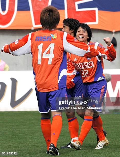 Atomu Tanaka of Albirex Niigata celerbates scoring his team's third goal during the J.League match between Ventforet Kofu and Albirex Niigata at...