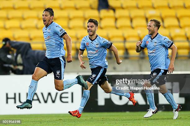 Filip Holosko of Sydney FC celebrates his goal with teammates Chris Naumoff and Rhyan Grant during the round 11 A-League match between the Wellington...