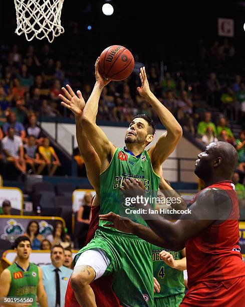 Omar Samhan of the Crocodiles attempts a layup during the round 11 NBL match between the Townsville Crocodiles and the Perth Wildcats on December 19,...