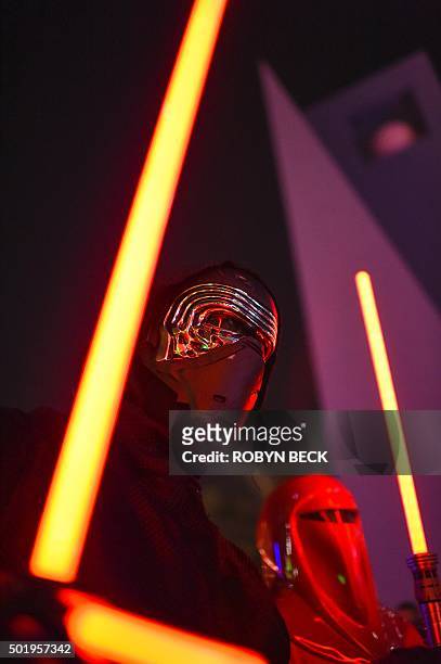 Star Wars fans dressed as Kylo Ren and an Imperial Guard attend Lightsaber Battle LA in Pershing Square in downtown Los Angeles, California on...
