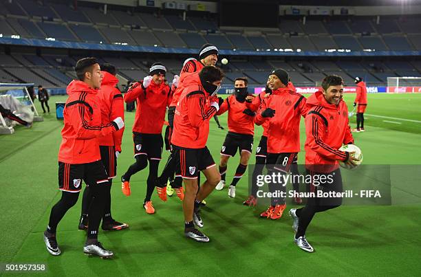 River Plate players in a relaxed mood during a training session at International Stadium Yokohama on December 19, 2015 in Yokohama, Japan.