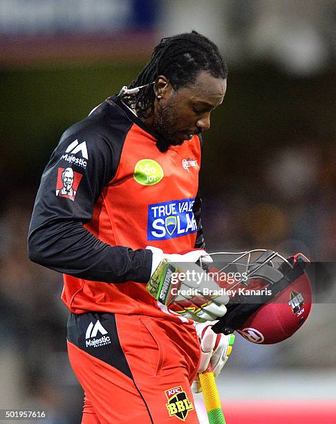 Chris Gayle of the Renegades walks from the field after being dismissed during the Big Bash League match between the Brisbane Heat and the Melbourne...