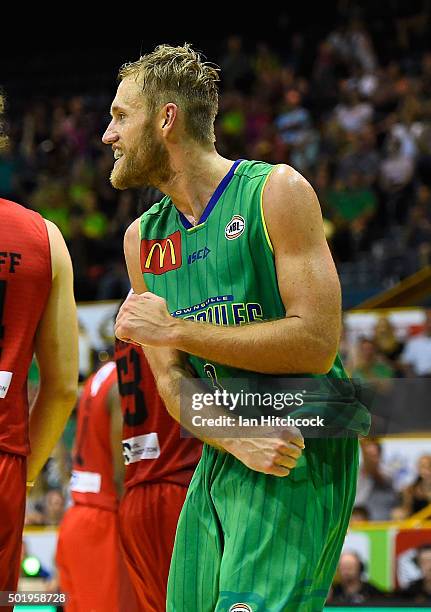 Mitch Young of the Crocodiles reacts after making a slam dunk during the round 11 NBL match between the Townsville Crocodiles and the Perth Wildcats...