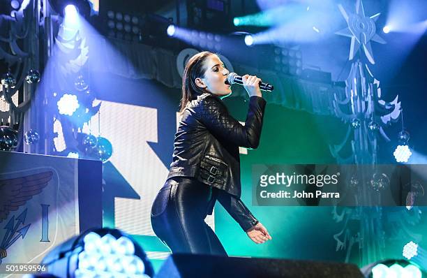Singer Chloe Angelides performs onstage with R. City during the Y100's Jingle Ball 2015 on December 18, 2015 in Miami, Florida.