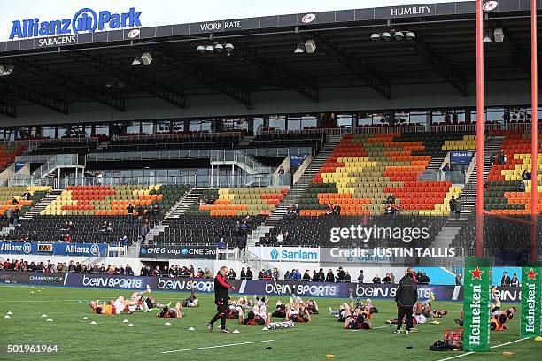 Oyonnax players warm up ahead of the European Rugby Champions Cup rugby union match between Saracens and Oyonnax at Allianz park in north London on...