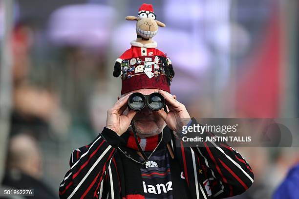 Saracens fan looks on from the stands ahead of the European Rugby Champions Cup rugby union match between Saracens and Oyonnax at Allianz park in...